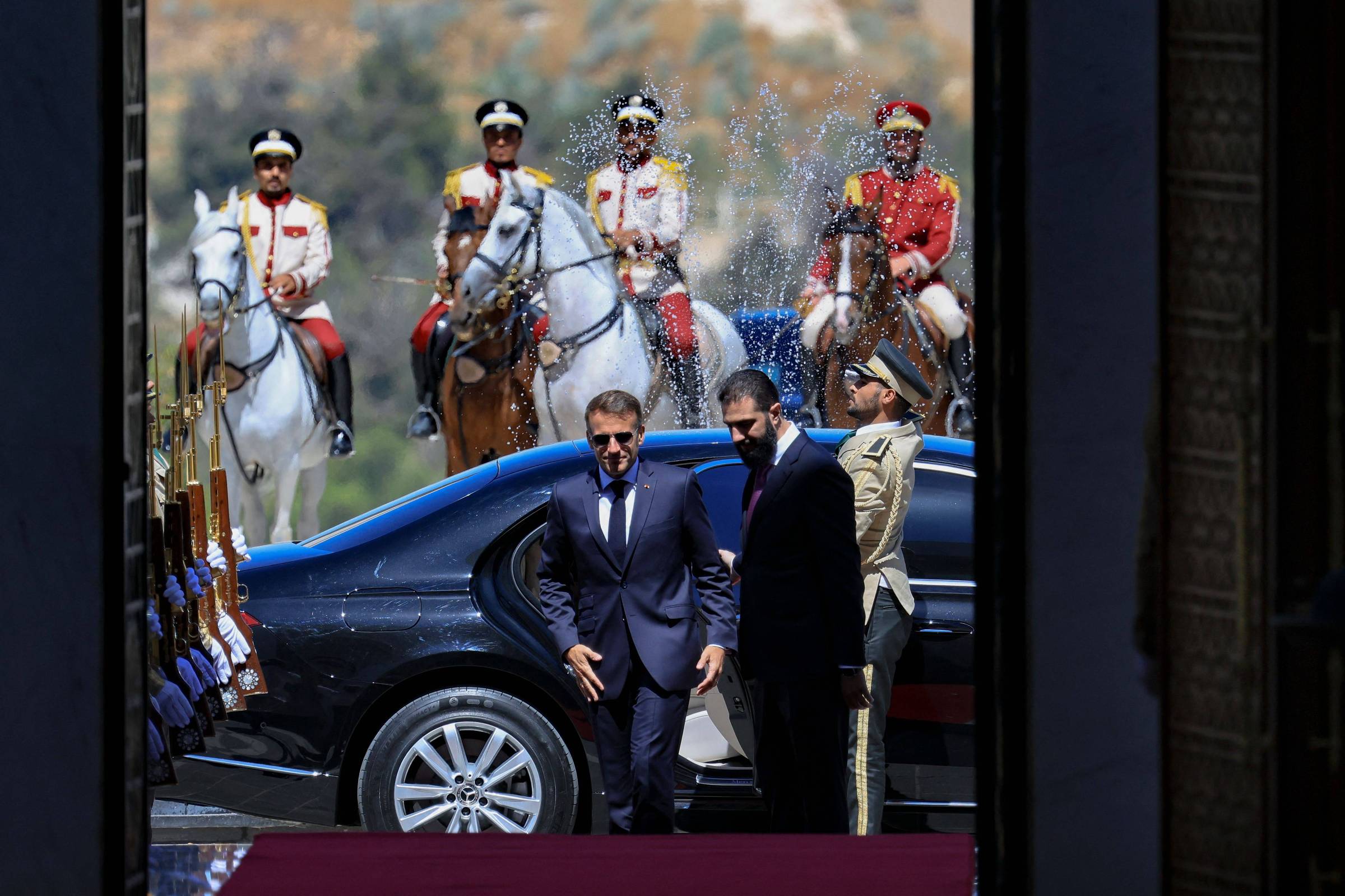 WATCH Blasts rock Damascus during Macron’s visit