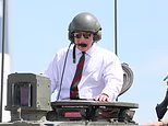 King Charles ditches suit jacket for tank ride on Dorset visit as he welcomes soldiers back home