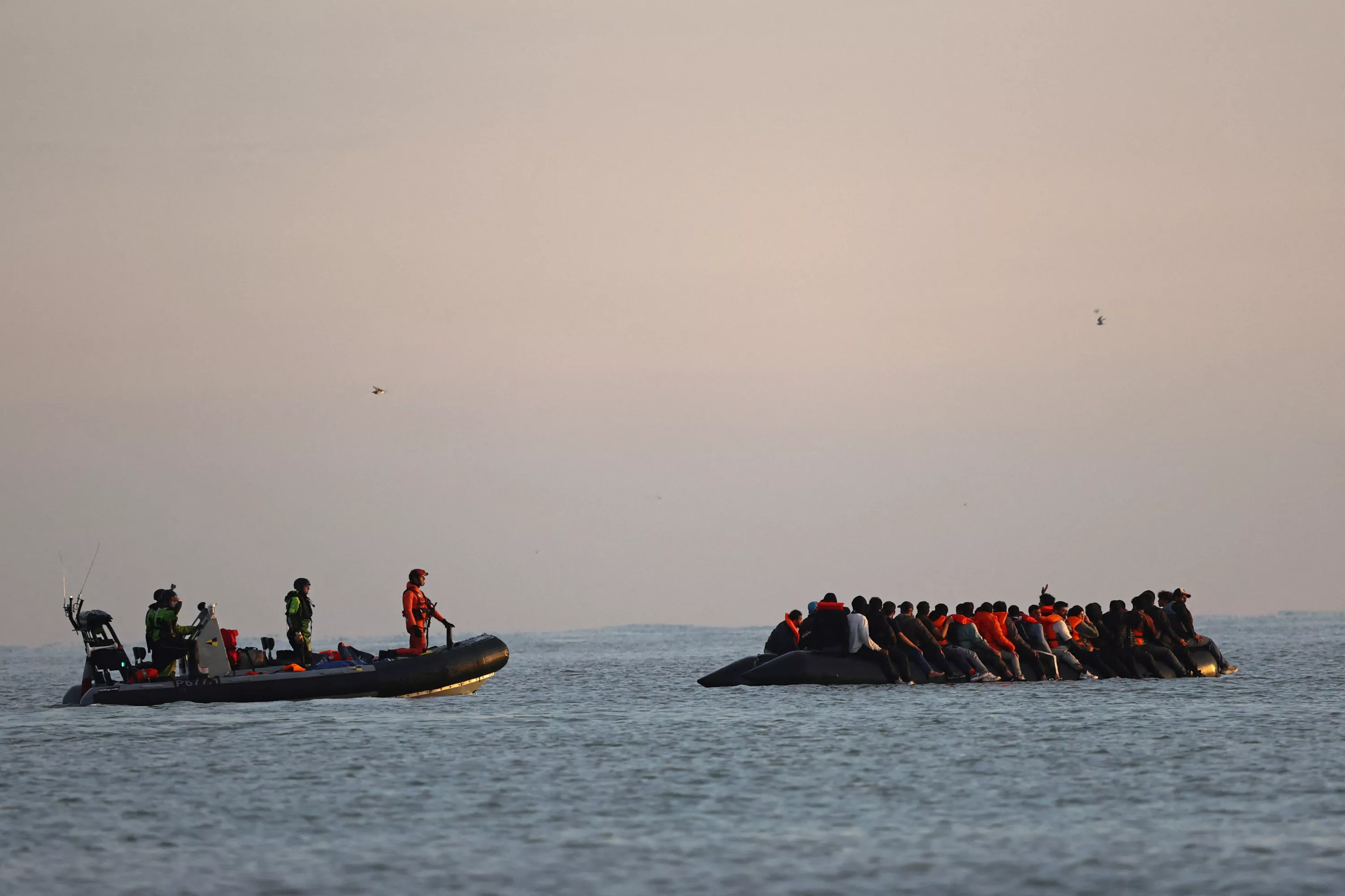 128 migrants crossed the Channel on a single boat, a record according to British press