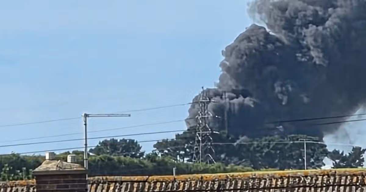Black smoke fills the air as fire breaks out at former oil refinery
