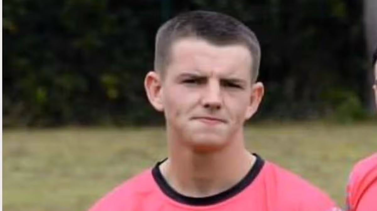 Young footballer found dead in woodland, inquest hears