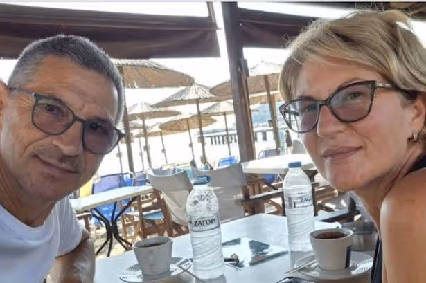 Ryanair passenger partially sucked out of plane window as wife clings to his feet