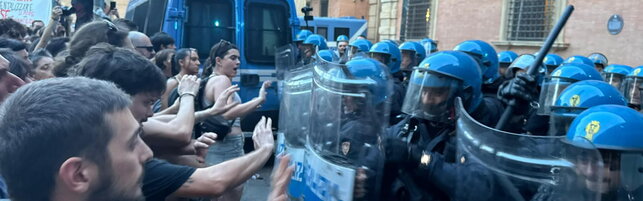 Launch of paper bomb by protesters and police office in Bologna