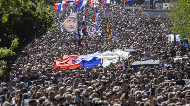 Thousands gather in Belgrade for Mladic's "hero" funeral