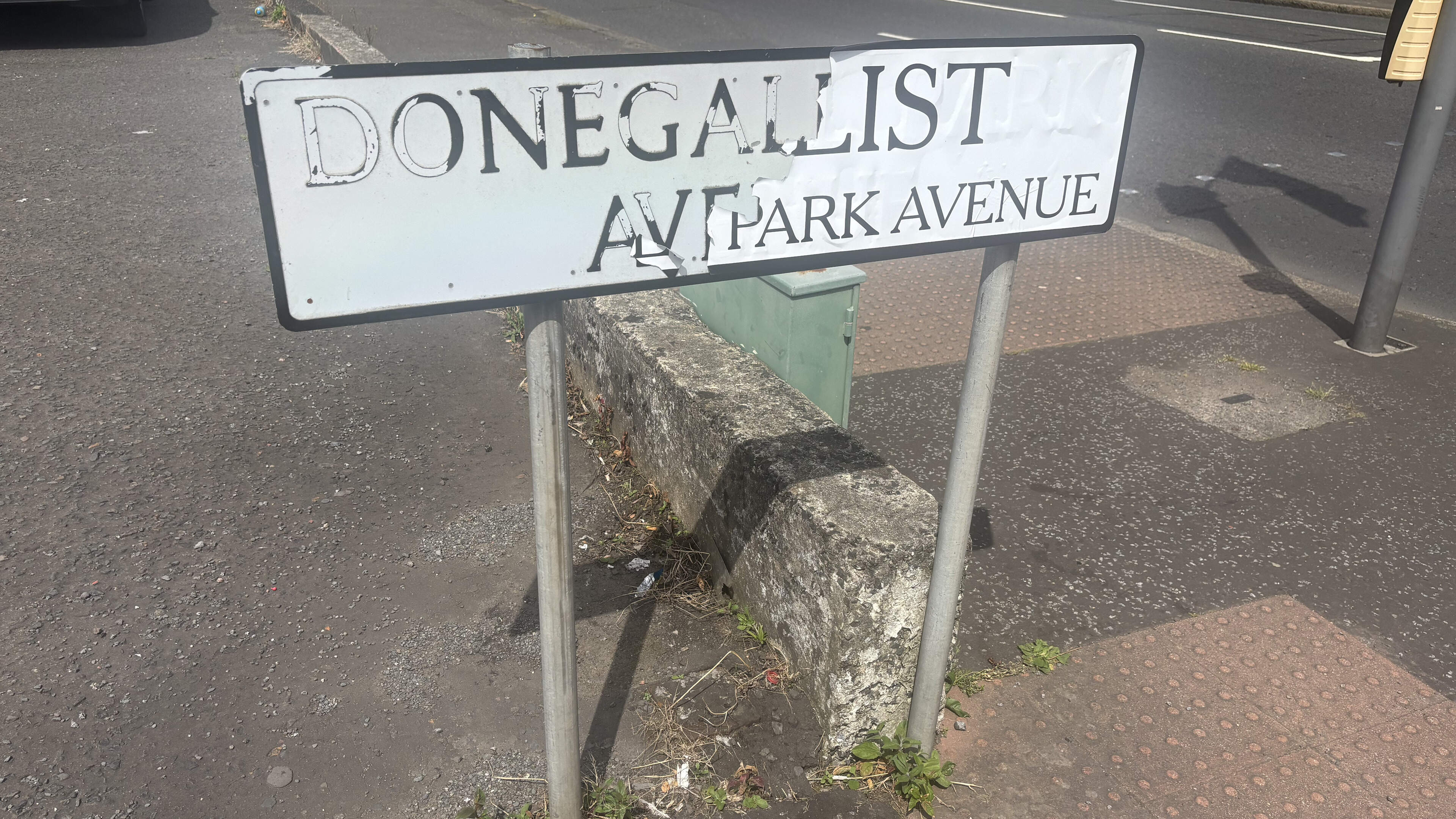 ‘Loyalist’ street sign partly removed as DUP and SDLP continue war of words
