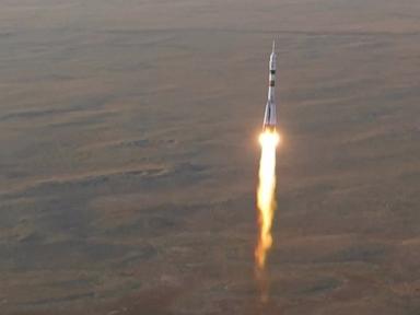 Russia sends American and two cosmonauts to space station