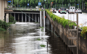 Heavy downpours cause flooding, damage, forcing over 600 to evacuate