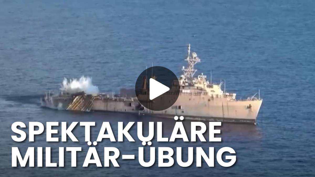 Fire from all sides: armed forces sinking discarded warship