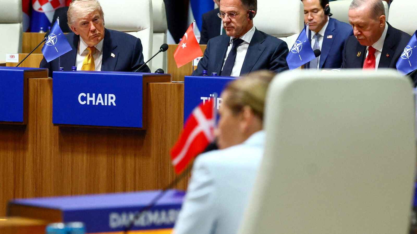 NATO countries, including the United States, reaffirm their "indefinite" commitment to the mutual assistance clause