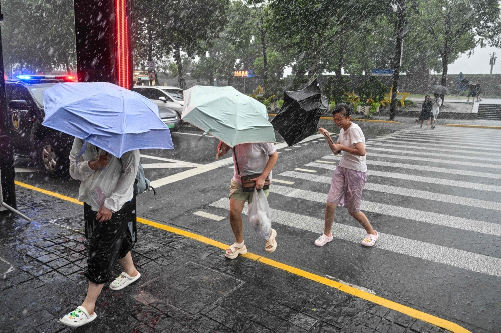 Typhoon Dolphin weakens but disrupts travel in east China