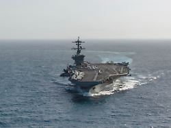 Trump says U.S. warship's 9-month deployment "not nearly long enough"